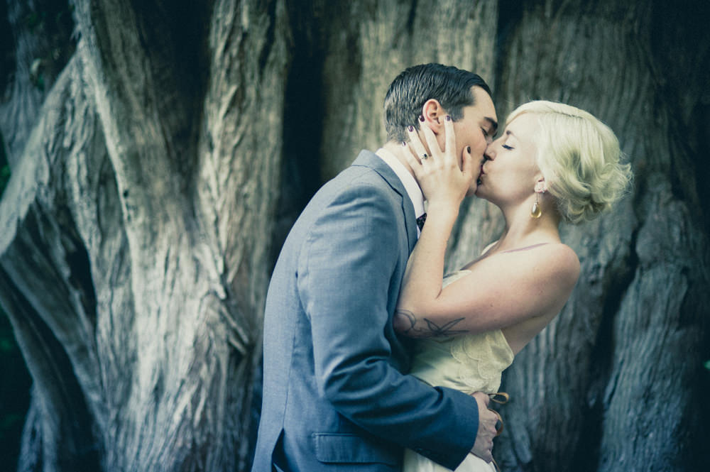 Couple Kissing Outside San Francisco Conservatory of Flowers