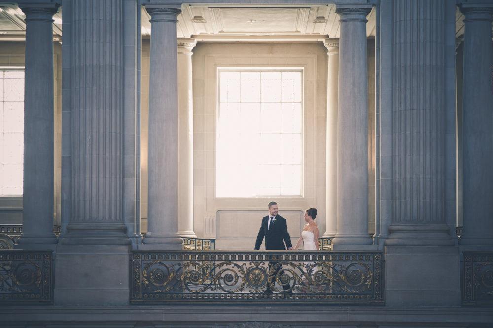 Couple Walking On Top Floor of San Francisco City Hall