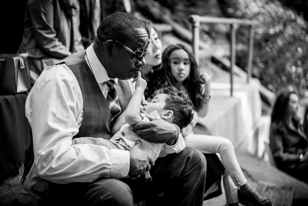 Black and white portrait of dad and son at Piedmont Community Hall wedding