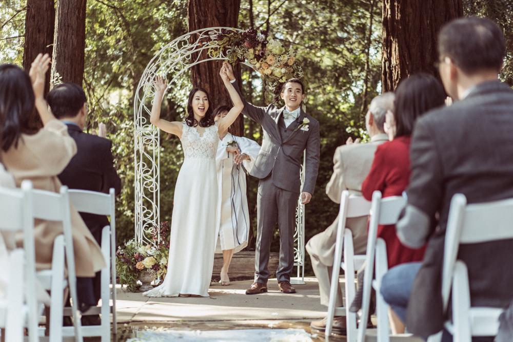 Bride and groom celebrate ceremony at Piedmont Community Hall wedding