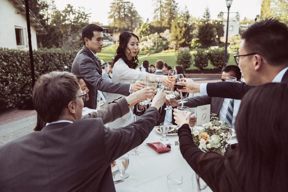 Bride and groom toasts table at Piedmont Community Hall wedding