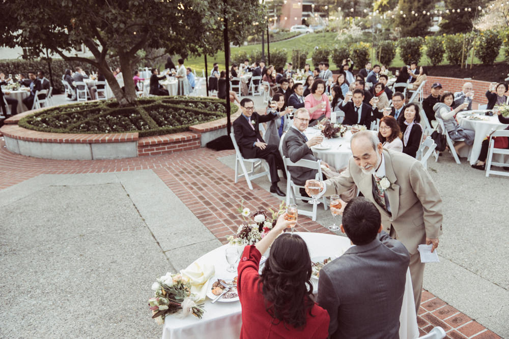 Father hugging bride after toast at Piedmont Community Hall wedding