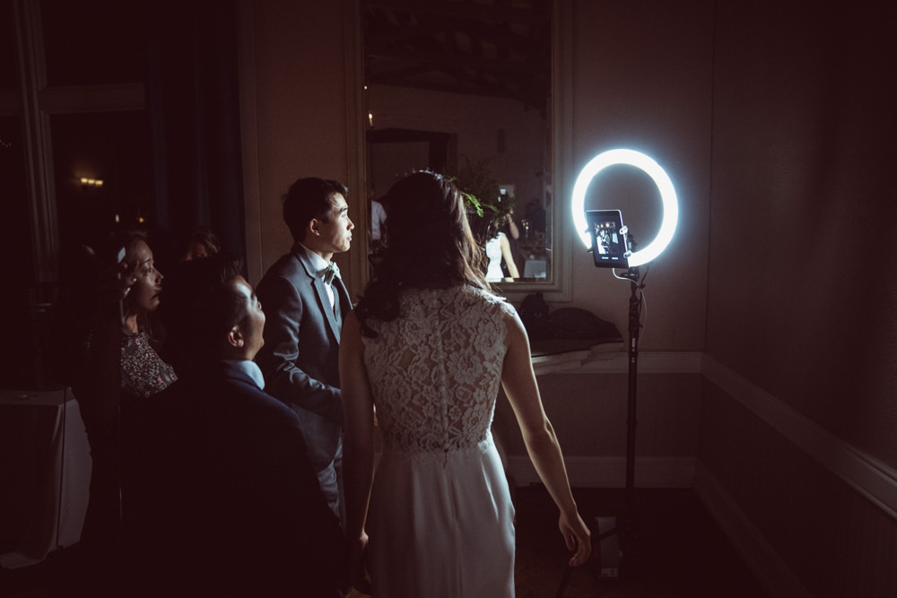 Guests in front of giffy.us ring light Piedmont Community Hall wedding