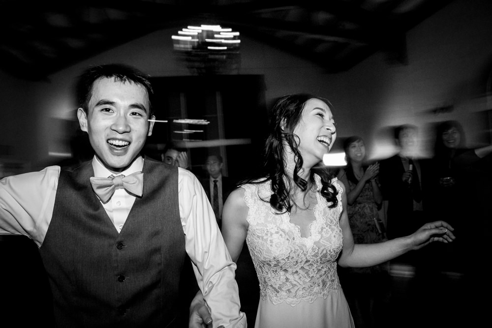 Black and white wedding dancing portrait at Piedmont Community Hall wedding