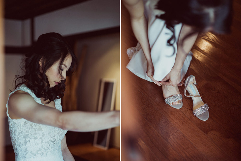 Bride putting on shoes at Piedmont Community Hall wedding