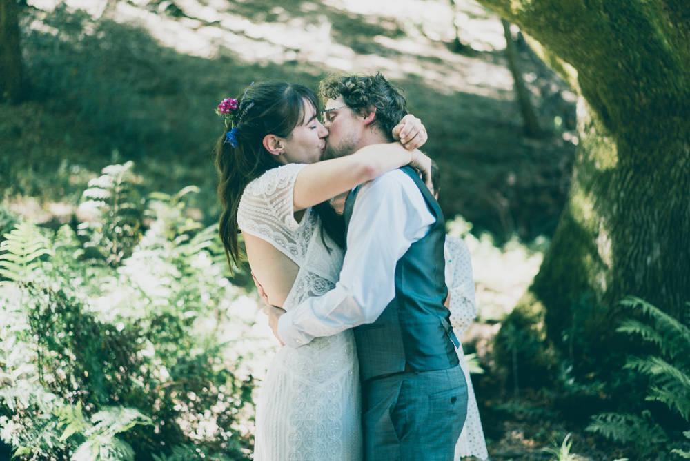 Napa summer outdoor wedding ceremony kiss