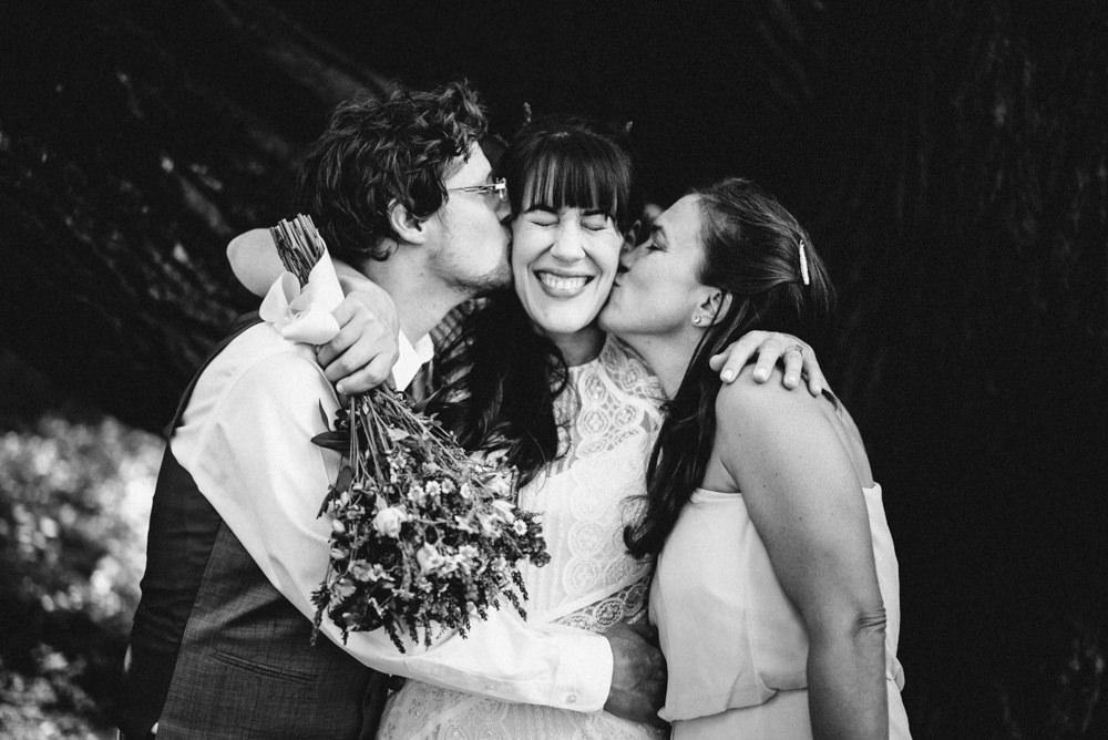 Black and white funny napa summer outdoors winemaker wedding kiss
