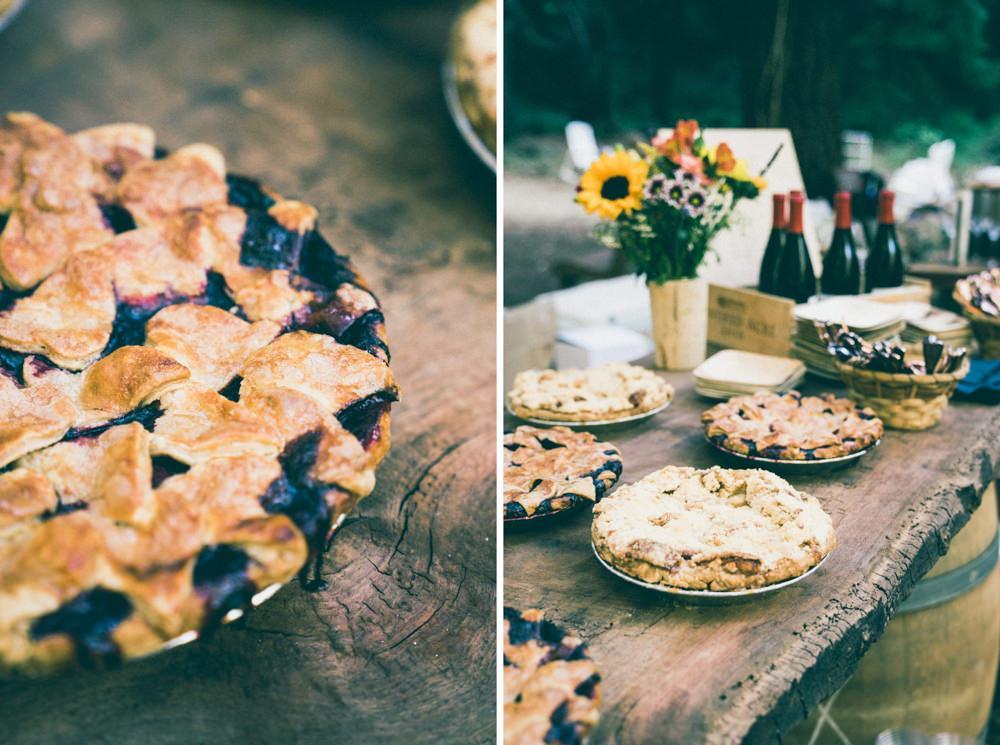Freshly baked wedding pies on reclaimed wood table in napa wedding
