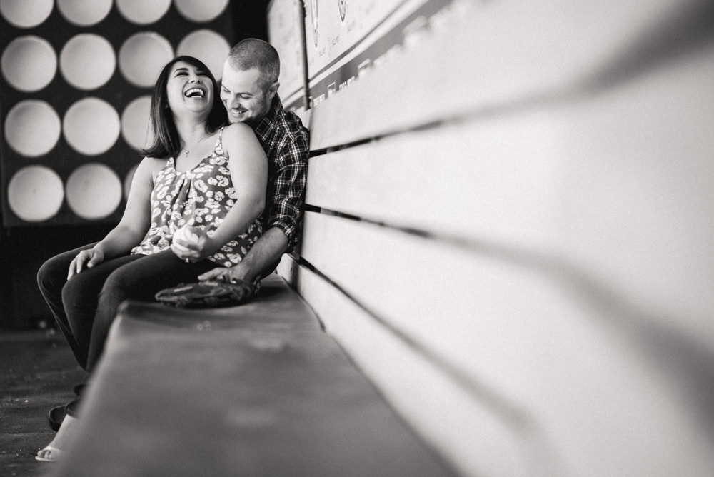 Black and white engagement shoot ideas at baseball stadium