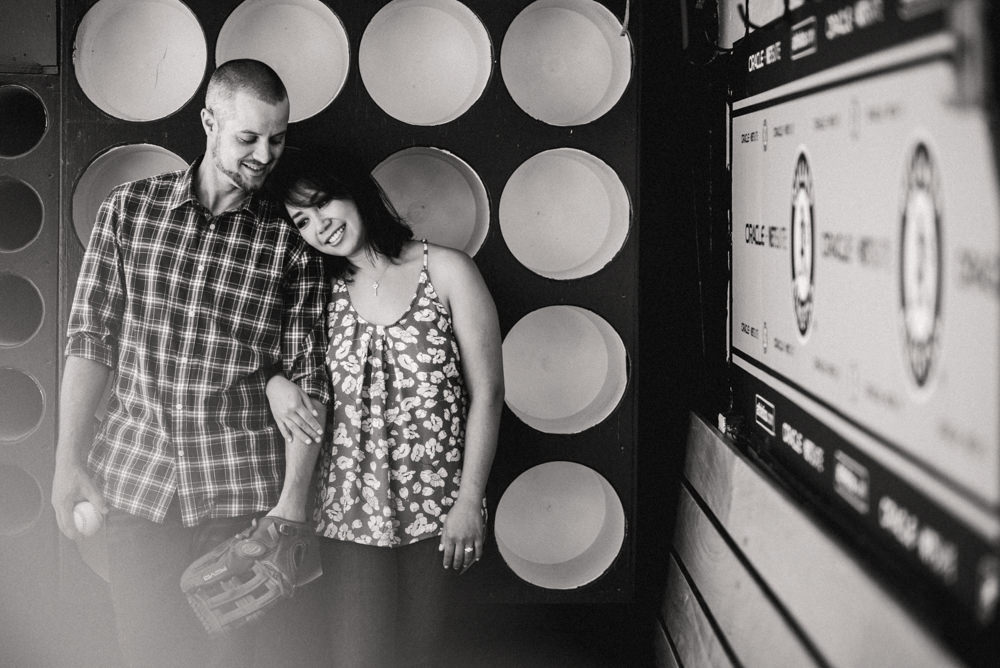 Black and white oakland coliseum baseball stadium engagement shoot