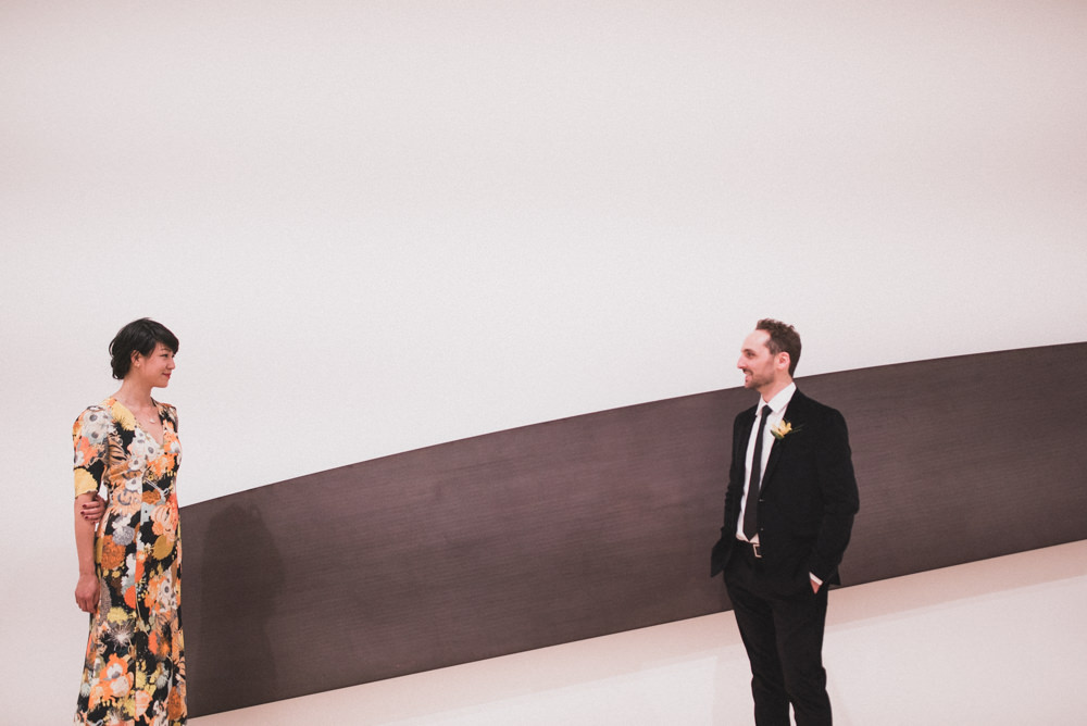 SF Moma wedding portrait in front of art work