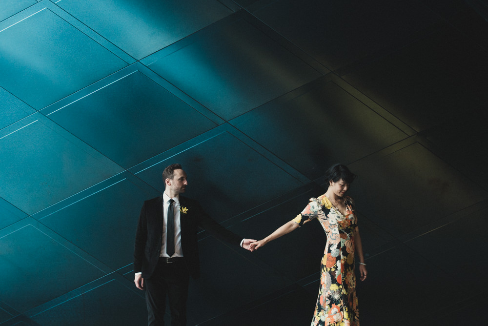 Beautiful shot of bride in floral dress outside Jewish Contemporary Museum