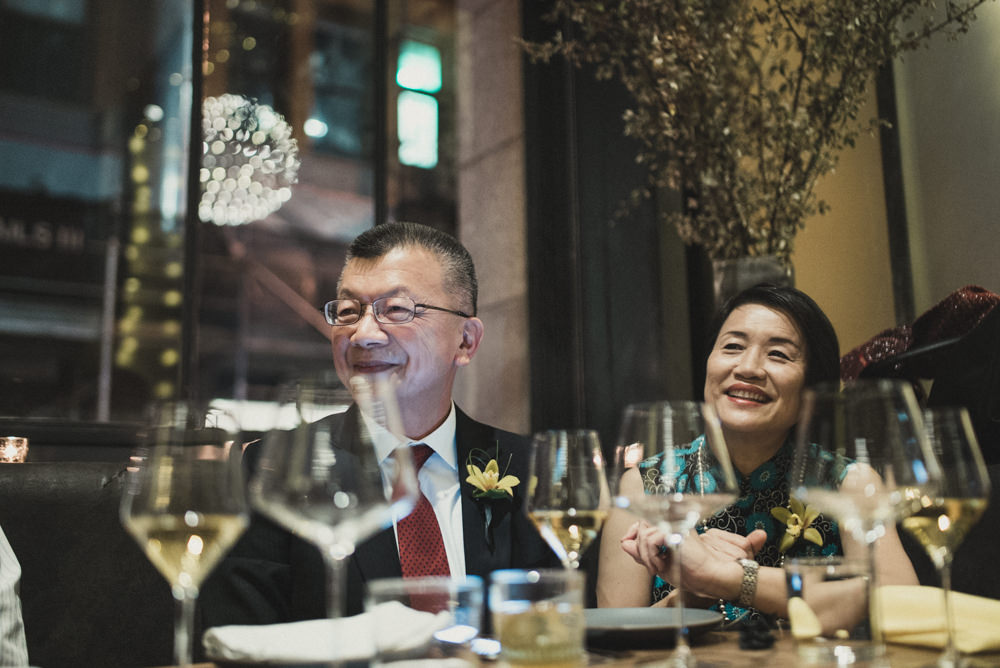 Photojournalistic photography of parents smiling