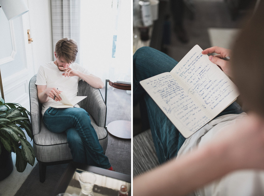 Candid shot of groomsmen writing wedding toast at the Palace Hotel