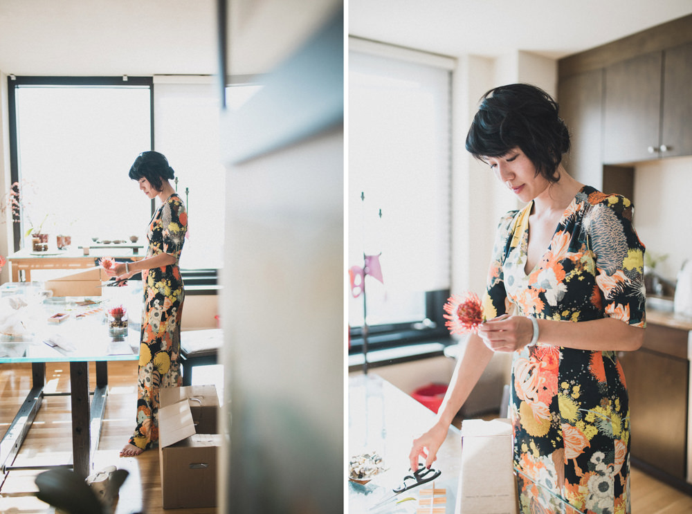 Bride in different kind of floral dress trimming flowers