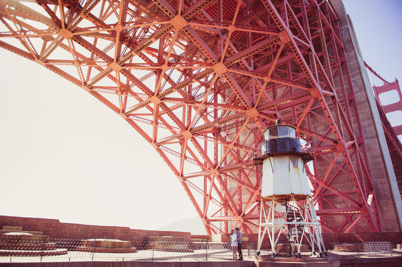 Engagement photography under Golden Gate Bridge at Fort Point