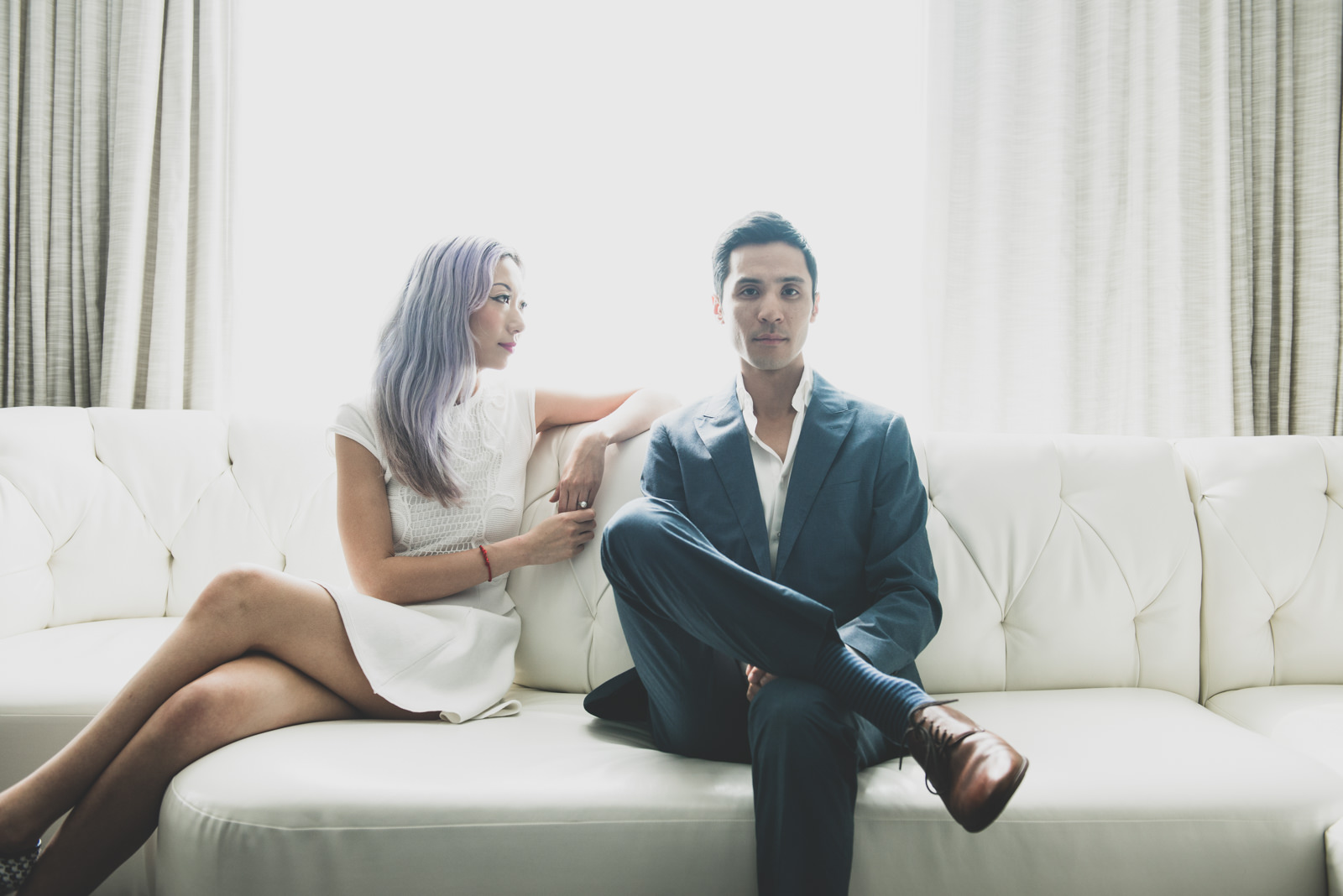 Couple in hotel for engagement shoot ideas