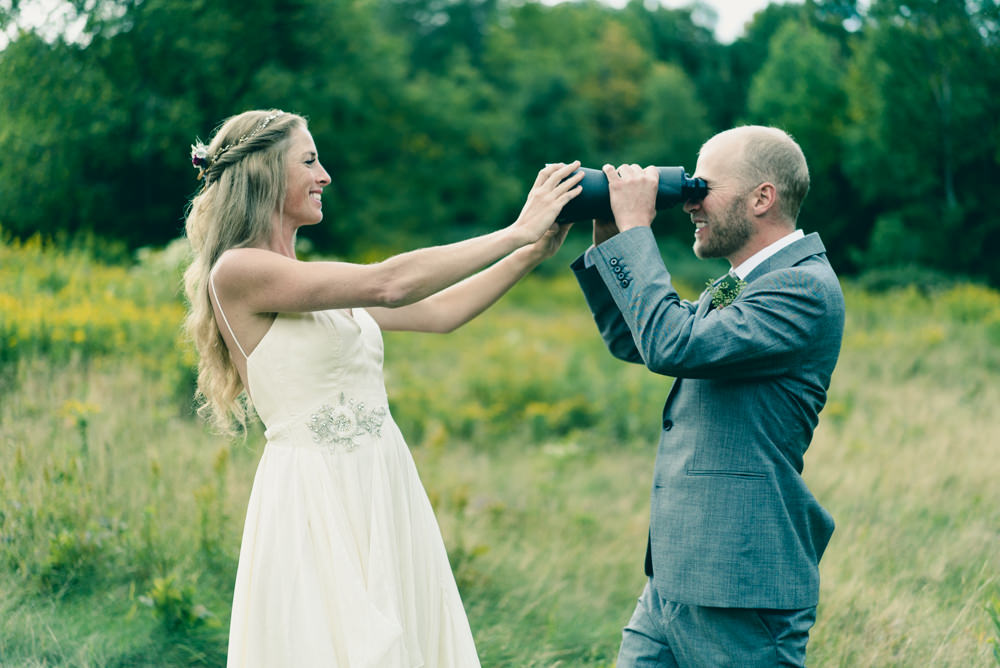 Safari themed outdoor wedding shoot with binoculars