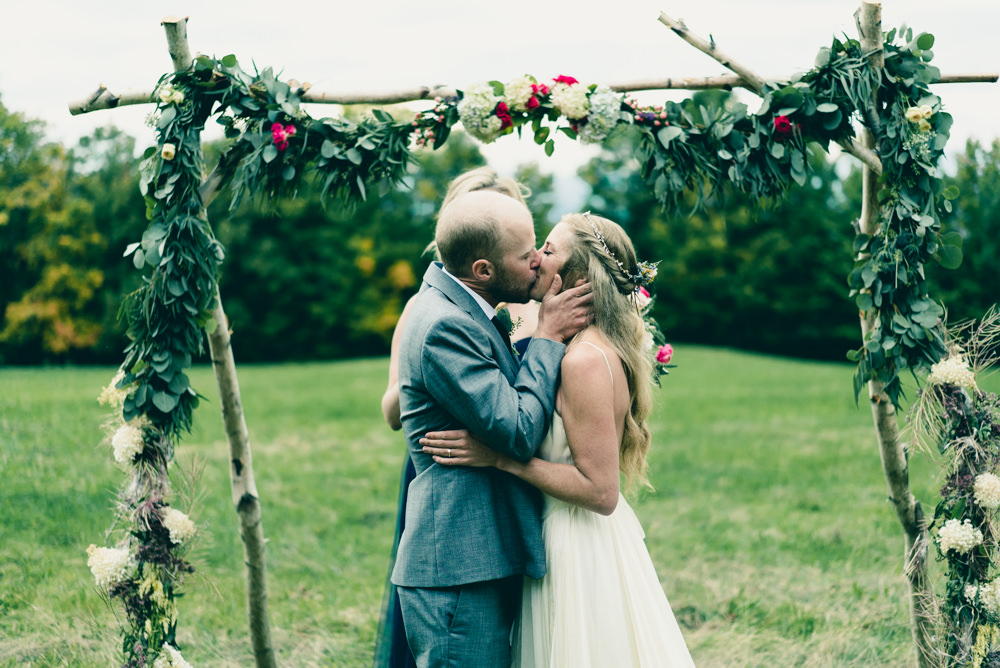 Rustic wildflower wedding altar idea